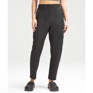 Lululemon‎ Sz 30 Black Light Utilitech Cargo
Pocket HR Pant High Rise Utility